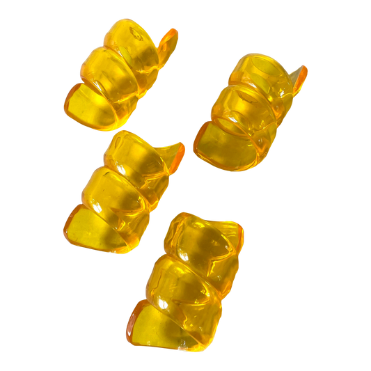 Anillos de servilleta giratorios acrílicos amarillos vintage
